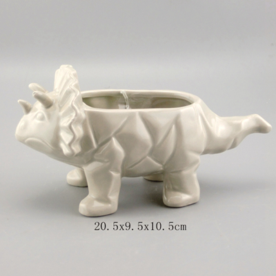 grey handmade ceramic dinosaur planter