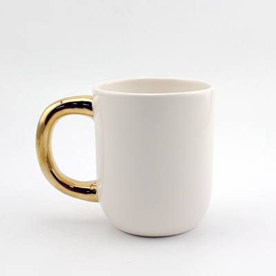 gold handle ceramic mug