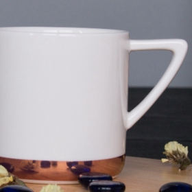big ceramic mug with rose gold bottom